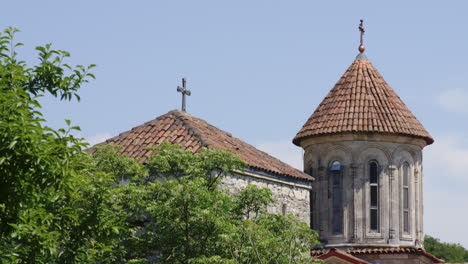 holy crosses on rooftops of motsameta monastery church towers, georgia