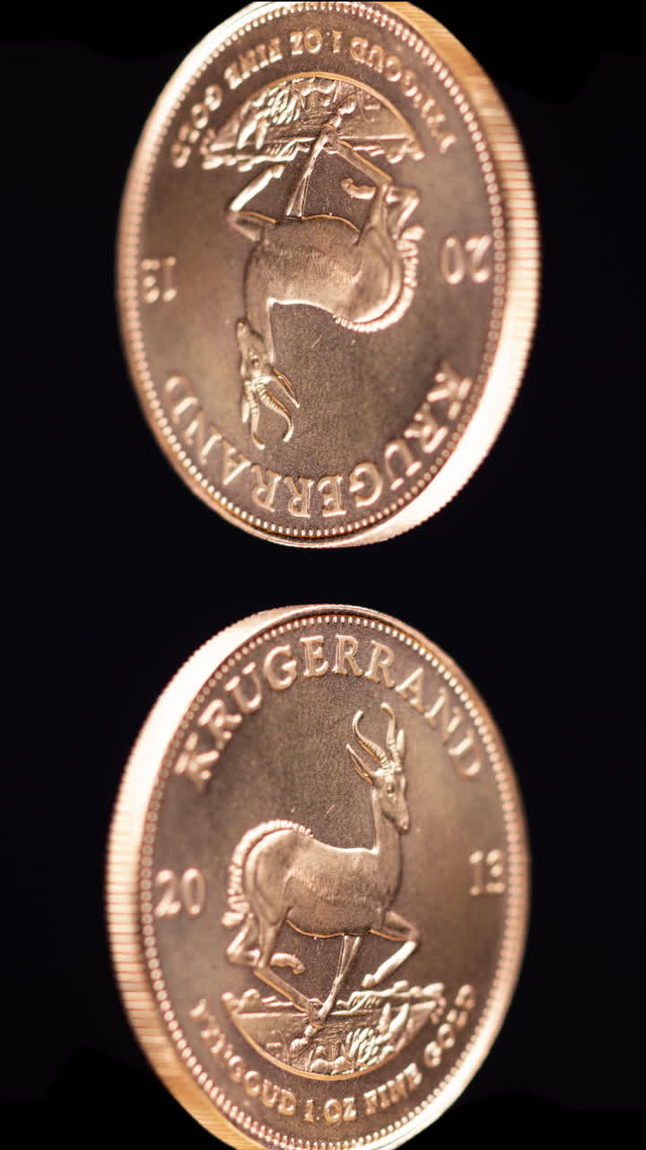 krugerrand de oro girando en vertical