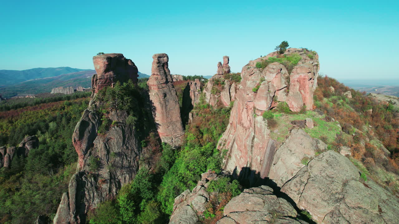 Aerial view of the large rock formations of Belogradchik, Bulgaria on a sunny day.