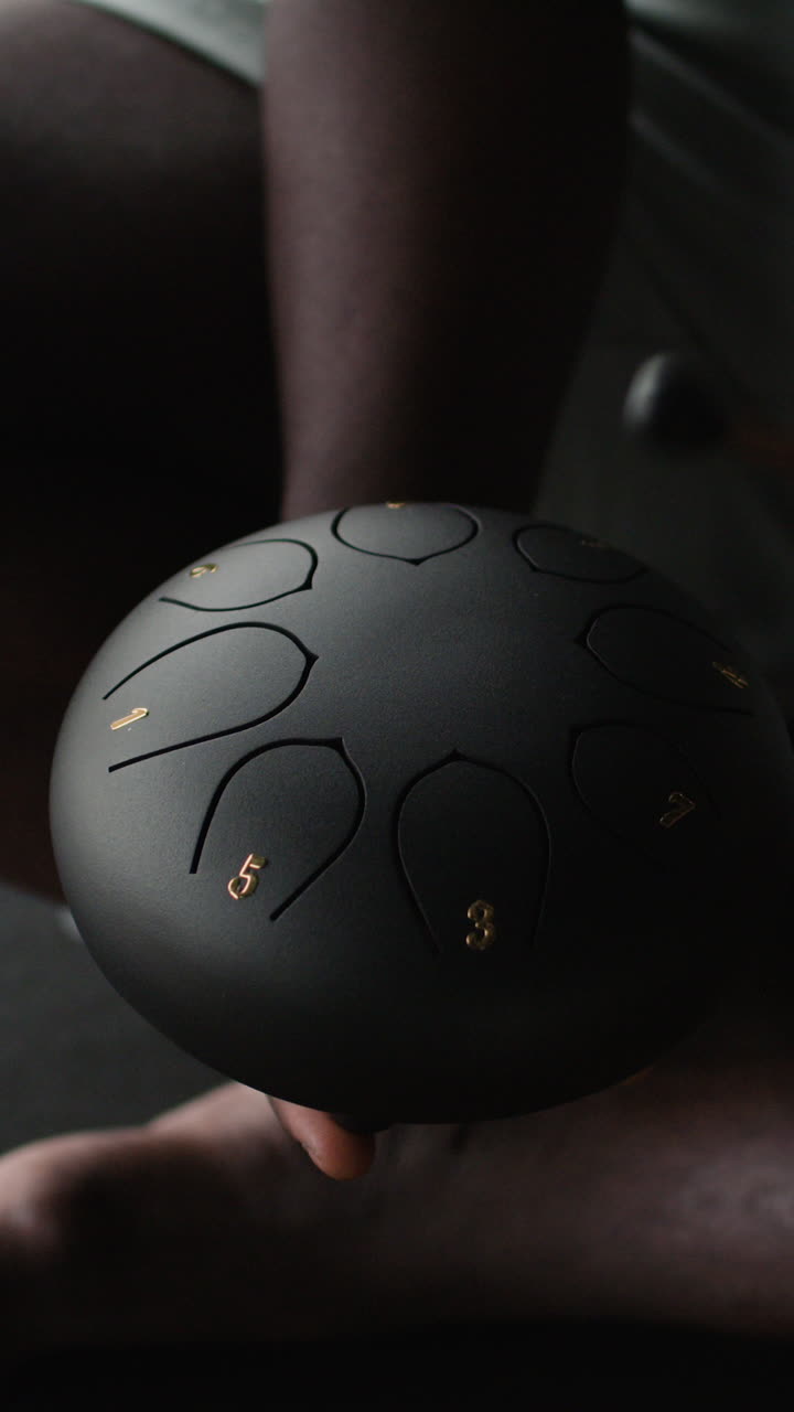 Person Playing a Handpan Drum