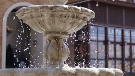 water flowing from a tiered fountain