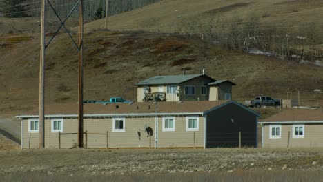 affordable housing in rural area close up cars parked