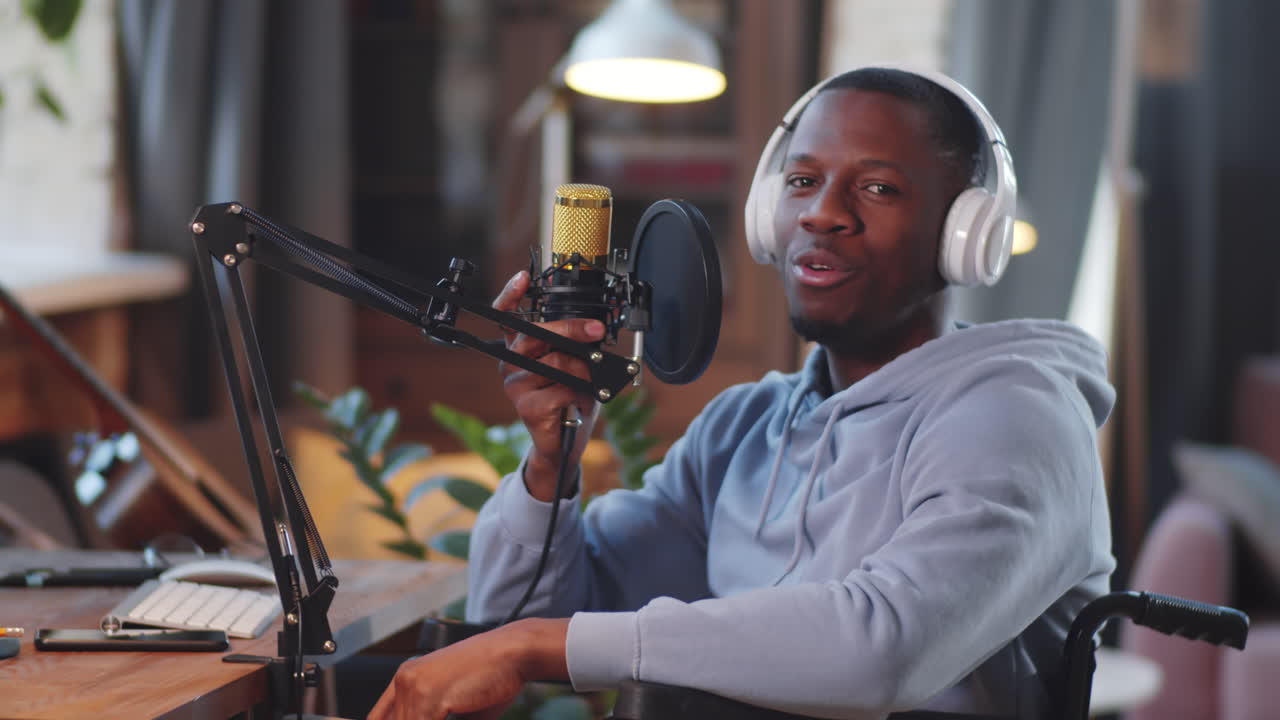 Man in Wheelchair Recording Podcast or Video Call