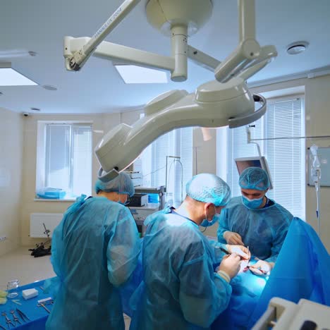 doctors performing surgery