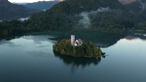 Looking-down-at-the-island-on-Lake-Bled-during-sunrise