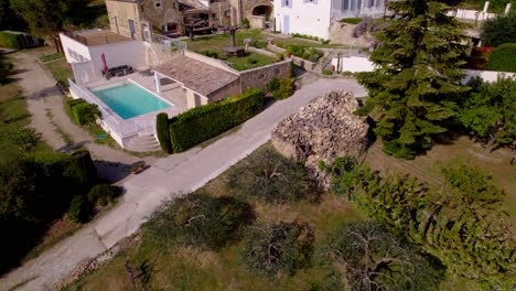 aerial establishing shot of a luxury villa with private pool in tresques