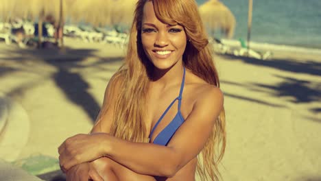 African-Girl-in-Bikini-Resting-at-Beach-Bench