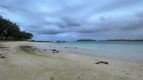 beautiful beach scene in mauritius under a stormy sky