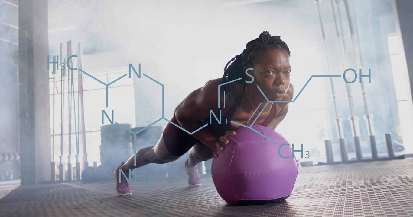 woman entering fitness doing plank pushups on purple ball toning core as molecular overlay shifting