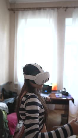 woman playing vr game at home