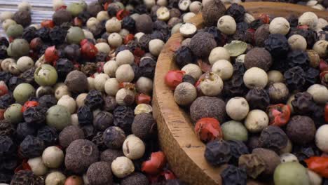 Macro-close-up-Mixed-peppercorns.-Dry-mix-peppercorns-close-up