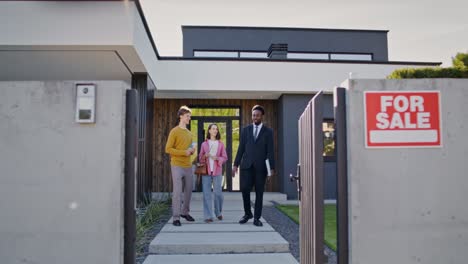 potential home buyers being shown house for sale.
