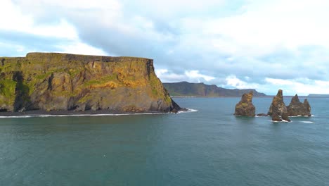 Aerial-view-of-Reynisdrangar-reveals-majesty-of-sea-stacks-on-Iceland's-southern-coast