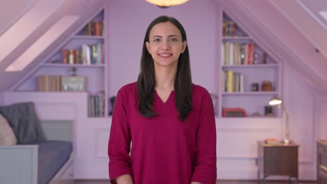 Happy-Indian-woman-looking-at-the-camera