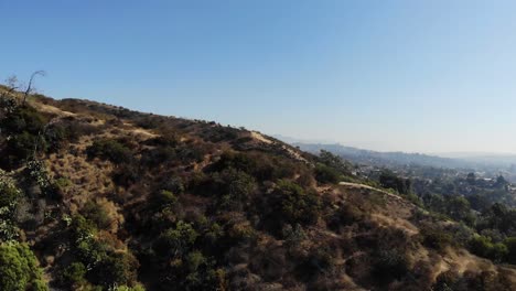 a hiking mountain in la. drone footage.