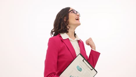 happy businesswoman celebrating success with fist pump
