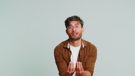 man rubbing fingers show cash gesture demands to pay back the debt take loan do shopping begging