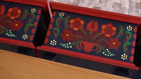painted wooden drawer front featuring traditional hungarian floral motifs