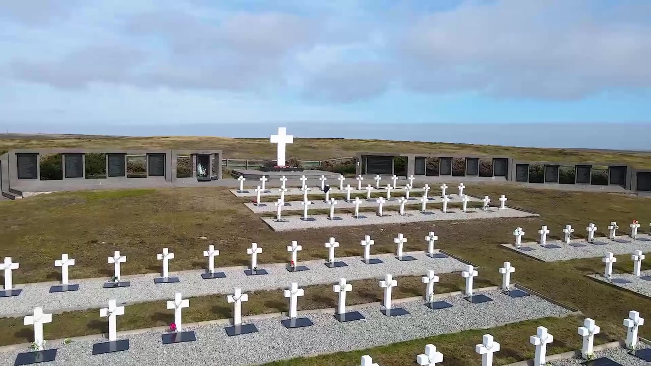Camera moving over the darwin cemetery in the falkland islands, where argentine soldiers are buried after the war