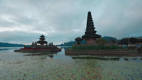 ulun danu beratan temple on lake bratan in bali, indonesia at dusk
