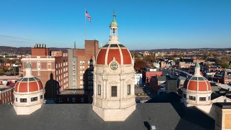 york, pennsylvania county government building with domes and american flag in background