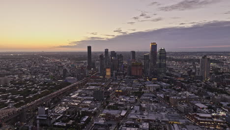 nyc new york aerial v357 flyover east river capturing bridge roadway traffic, skyscrapers cityscape of long island city in queens against dawn sunrise sky - shot with mavic 3 pro cine - september 2023