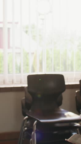 woman looking away from window