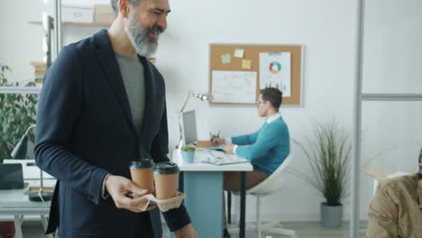 office colleagues enjoying coffee and working