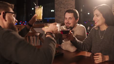 friends celebrating at a bar