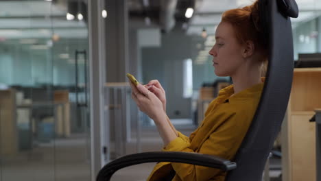 girl spinning in office chair