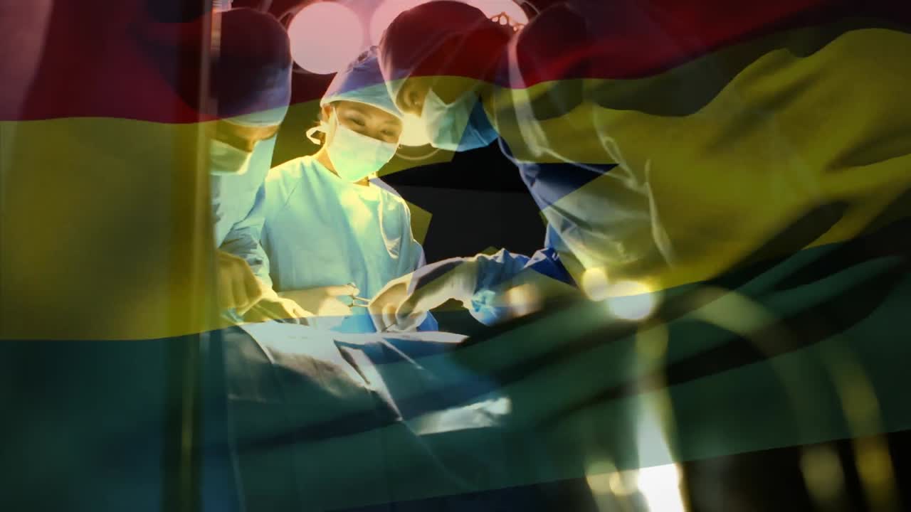 Animation of flag of ghana waving over surgeons in operating theatre