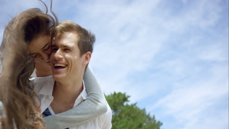 happy couple enjoying outdoors smiling arms outstretched spinning slow motion shot on red epic dragon