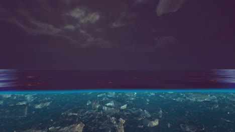 nighttime ocean view with calm waters and dark sky reflecting light