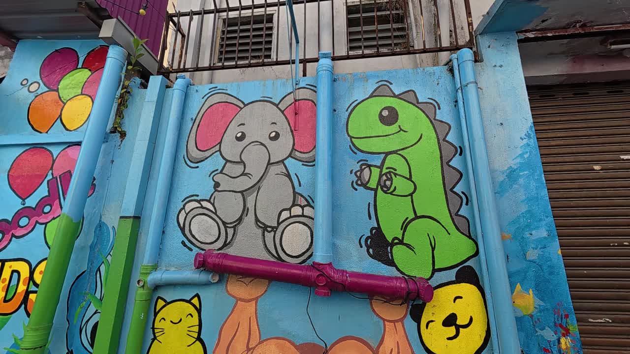 Vivid street art and murals line the pedestrian walkways of Seremban, Malaysia. These artworks portray themes like culture, daily life, and history, reflecting the local community's essence.