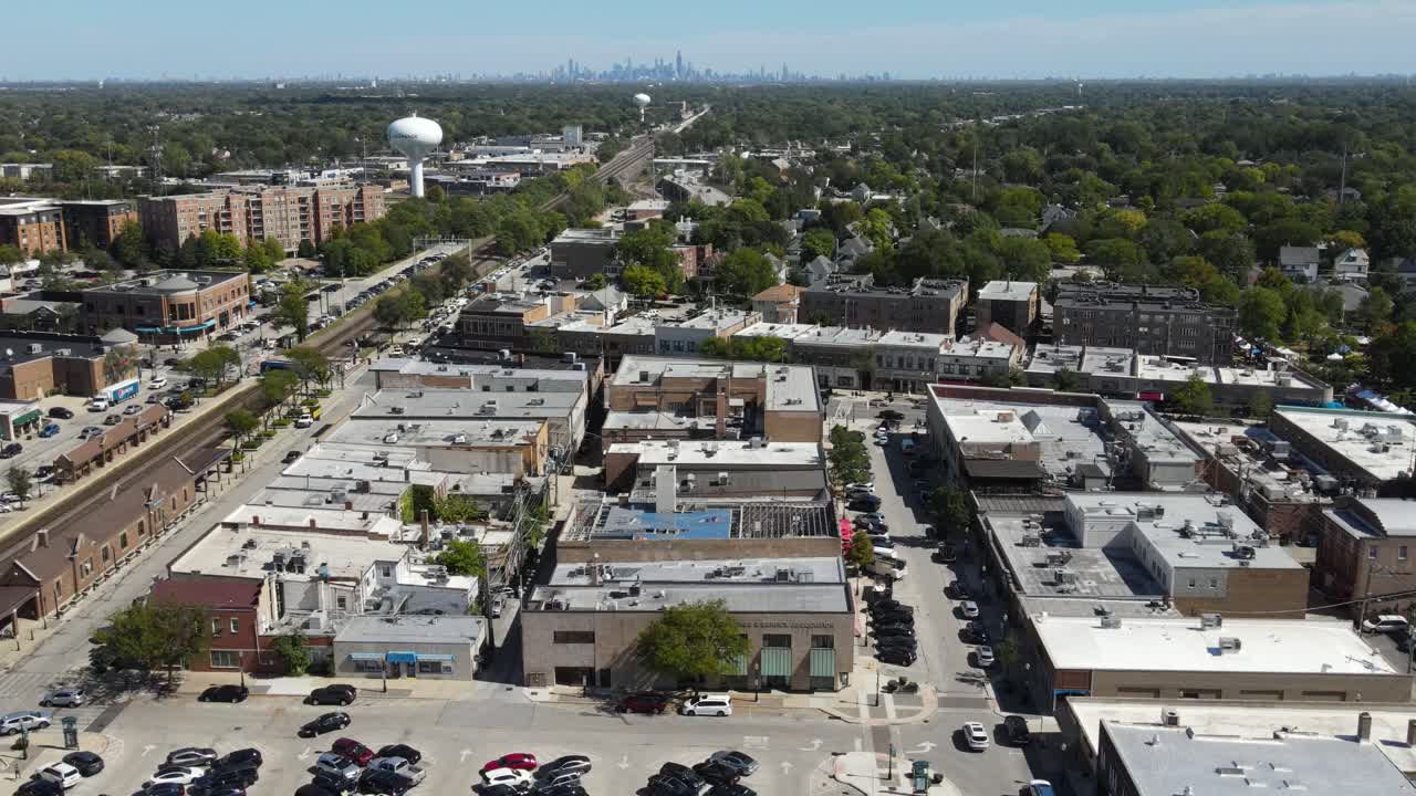 La Grange, IL on a sunny fall day, showcasing streets, buildings, and the suburban landscape With Downtown Chicago in Background. Crane Up Zoom x1 Day E