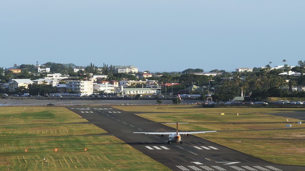 An ATR 72-600 light airplane takes off at the Noumea Magenta aerodrome to transport tourists to the Loyalty Islands