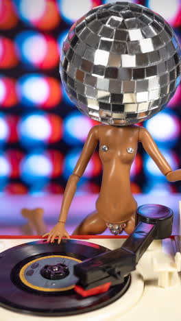 discodoll dancing on turntable