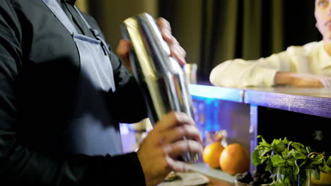 bartender preparing a cocktail