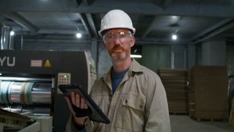 factory worker with tablet