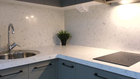 camera shoots artificial drink near and far in kitchen