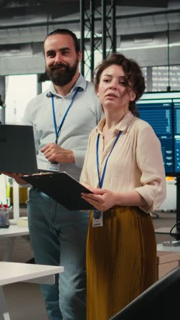 vertical video team of office workers collaborating on project planning and briefing