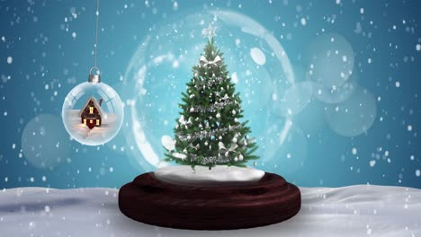 Animation-of-snow-globe-with-christmas-tree-and-christmas-bauble-with-house-over-snow-falling
