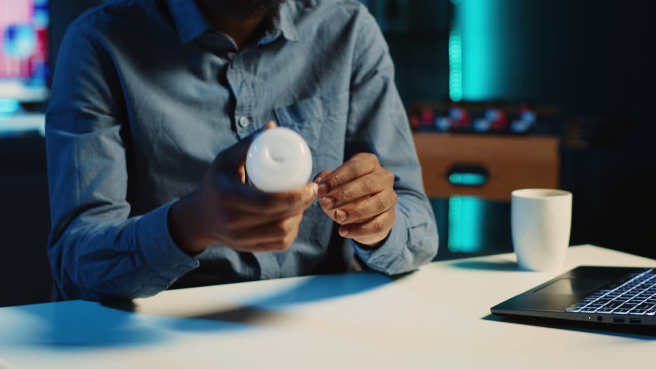 Media star reviews light bulb in studio