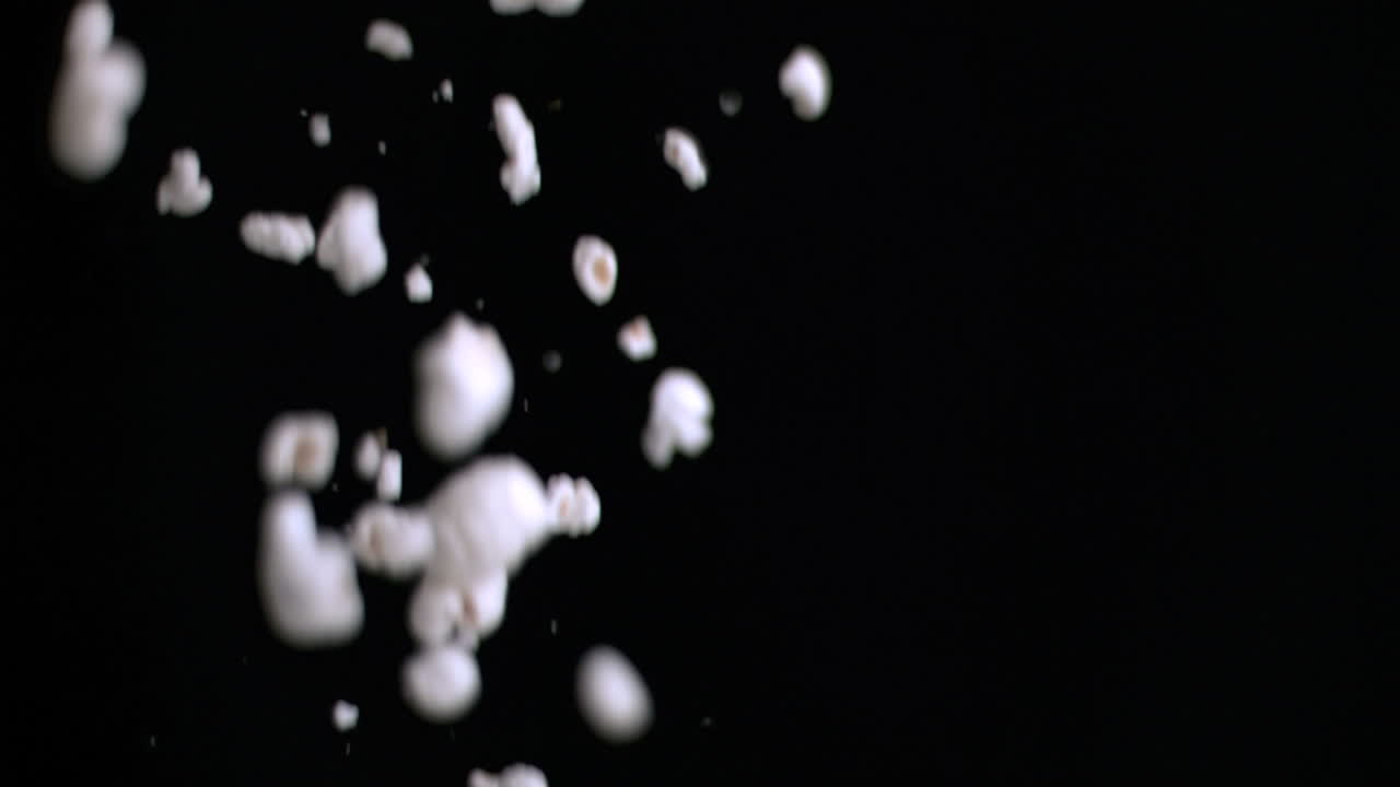 Popcorn falling down in super slow motion