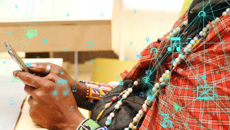 animación de iconos conectados globos sobre hombre afroamericano usando teléfono inteligente