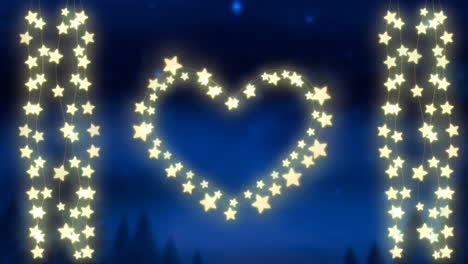 corazón brillante y cuerdas de luces de hadas sobre fondo azul