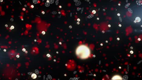 iconos de copos de nieve contra manchas rojas de luz flotando contra un fondo negro