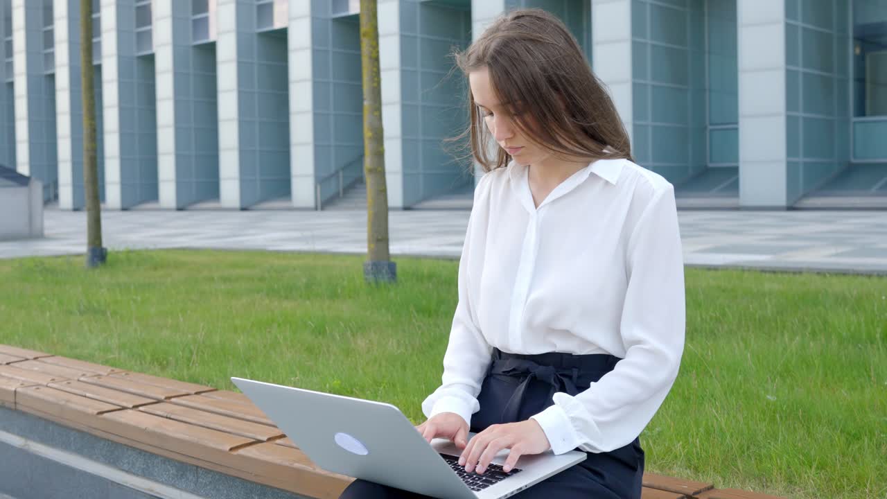 Nordic Woman Concentrating by Office Building, Slow Motion
