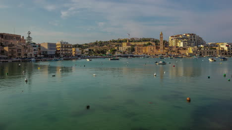 Popeye-Village,-picturesque-little-inlet-known-as-Anchor-Bay,-Malta