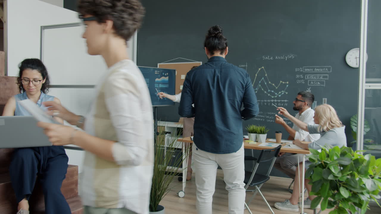 Business Team Presenting Sales Data